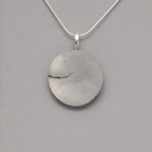 smoke fired ceramic pendant - grey and black on a silver necklace