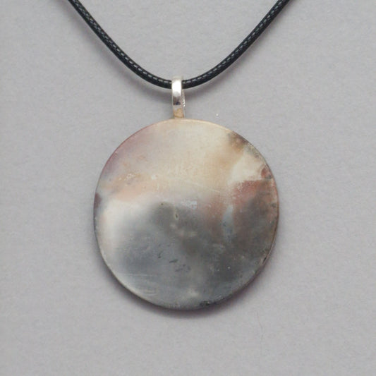Smoke fired ceramic pendant