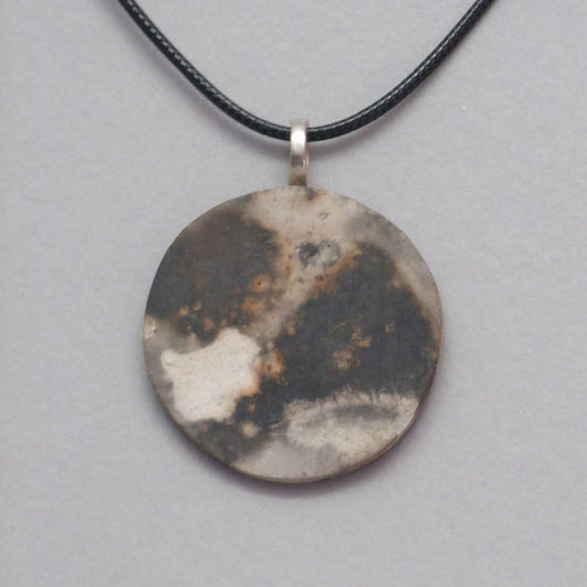Smoke fired ceramic pendant