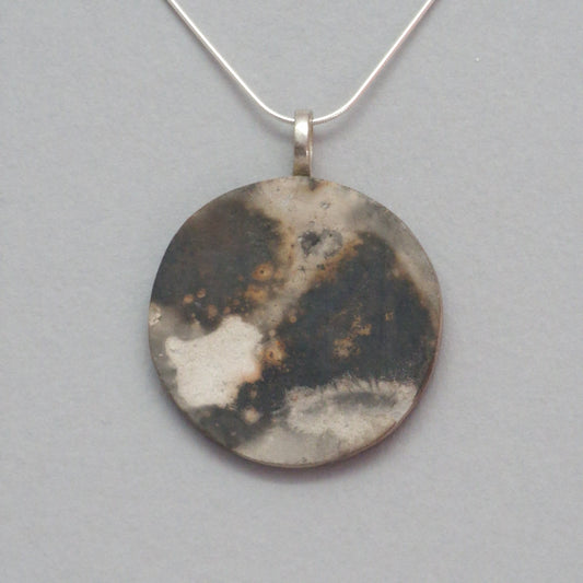 Smoke fired ceramic pendant