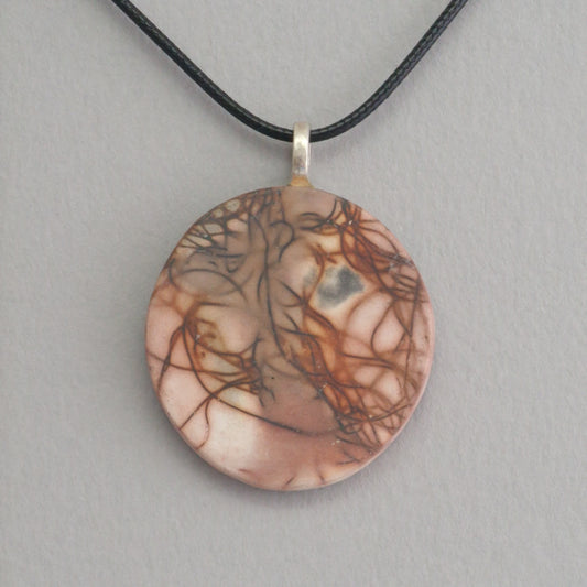 Smoke fired ceramic pendant