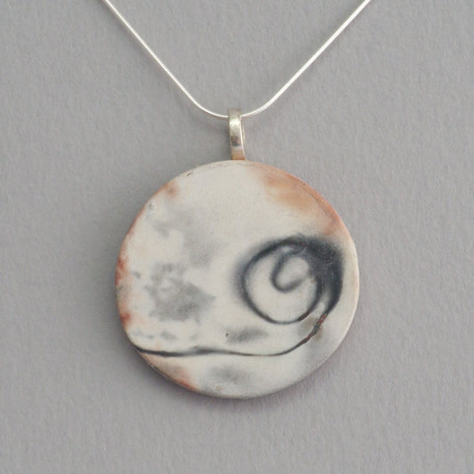 Smoke fired ceramic pendant