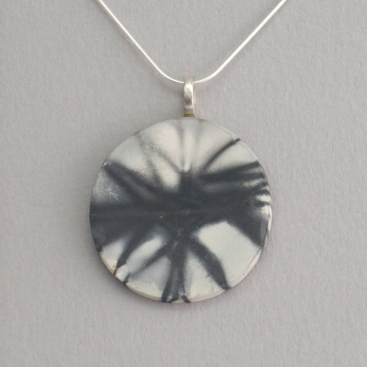 Smoke fired ceramic pendant