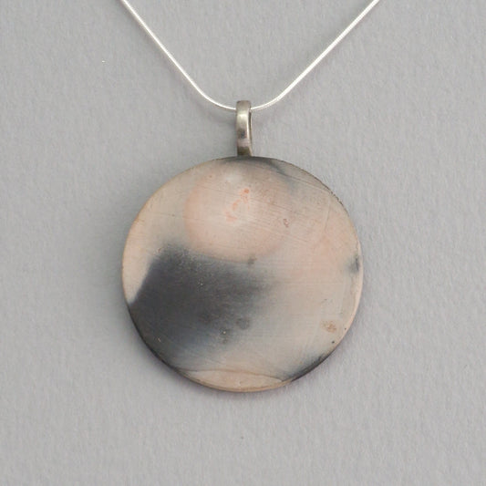 Smoke fired ceramic pendant