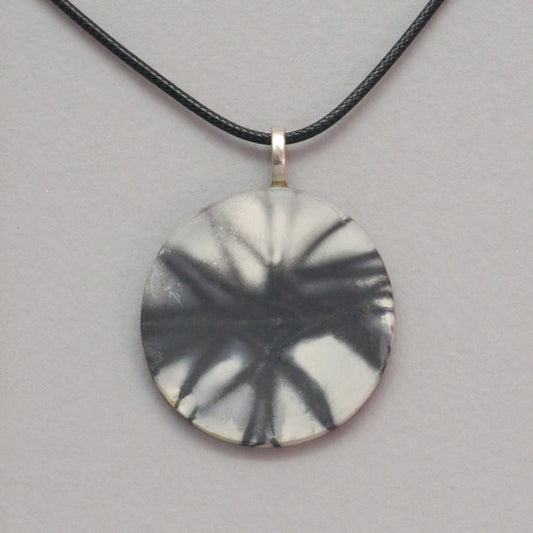 Smoke fired ceramic pendant