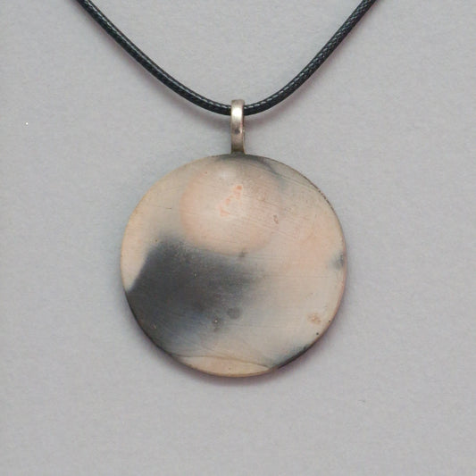 Smoke fired ceramic pendant