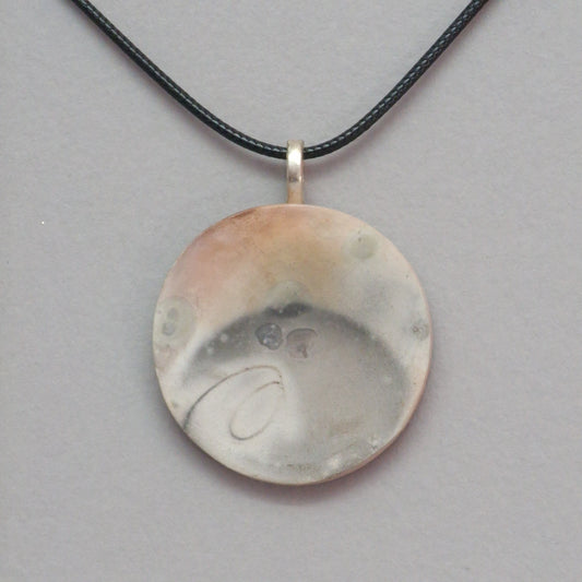 Smoke fired ceramic pendant