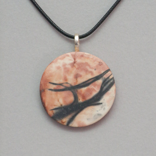 Smoke fired ceramic pendant