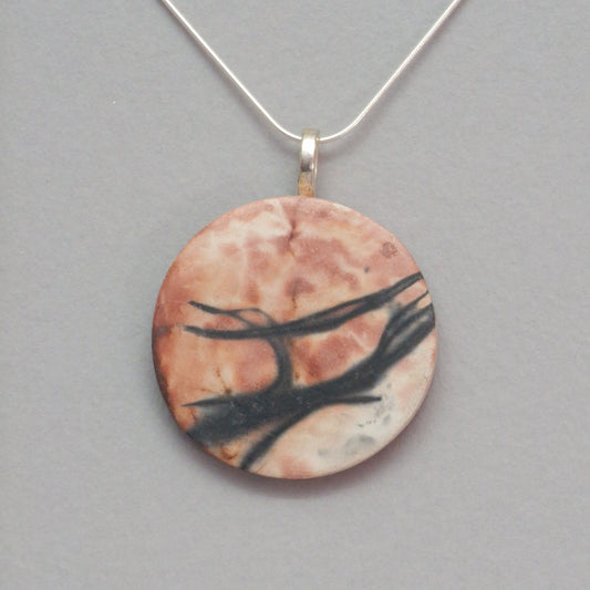 Smoke fired ceramic pendant