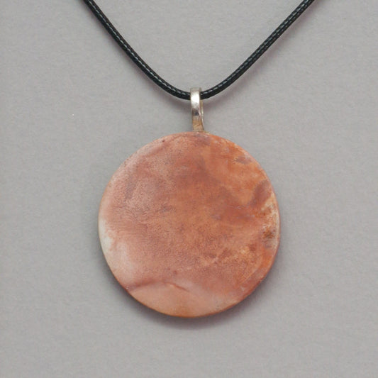 Smoke fired ceramic pendant