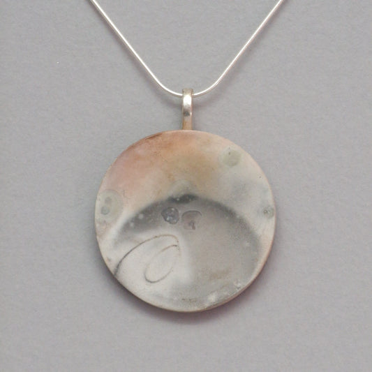 Smoke fired ceramic pendant