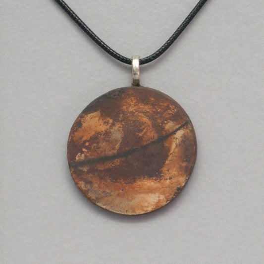 Smoke fired ceramic pendant