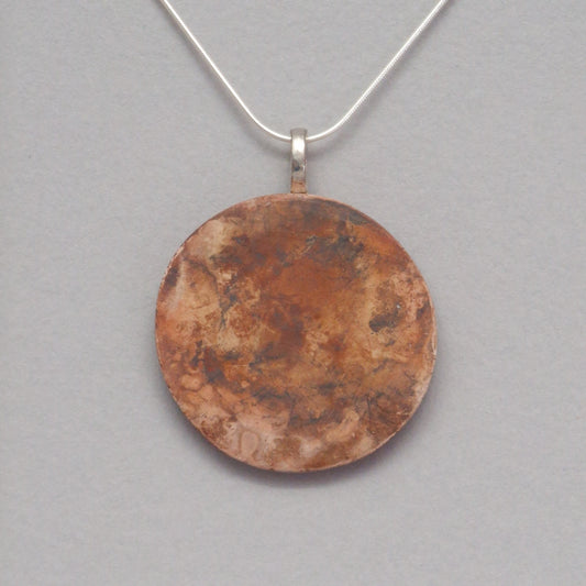 Smoke fired ceramic pendant