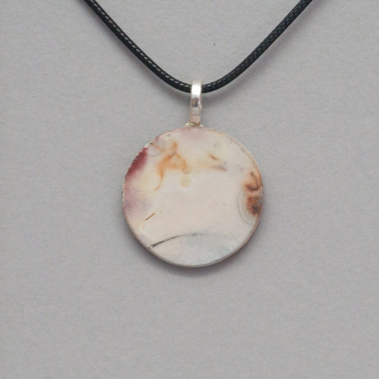 Smoke fired ceramic pendant