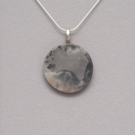 Smoke fired ceramic pendant