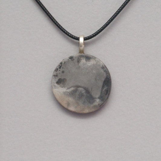 Smoke fired ceramic pendant