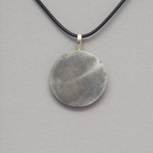 Smoke fired ceramic pendant