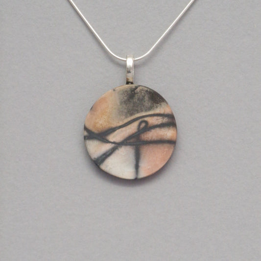 Smoke fired ceramic pendant